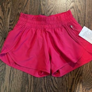 NWT Lululemon red Tracker shorts Size 4